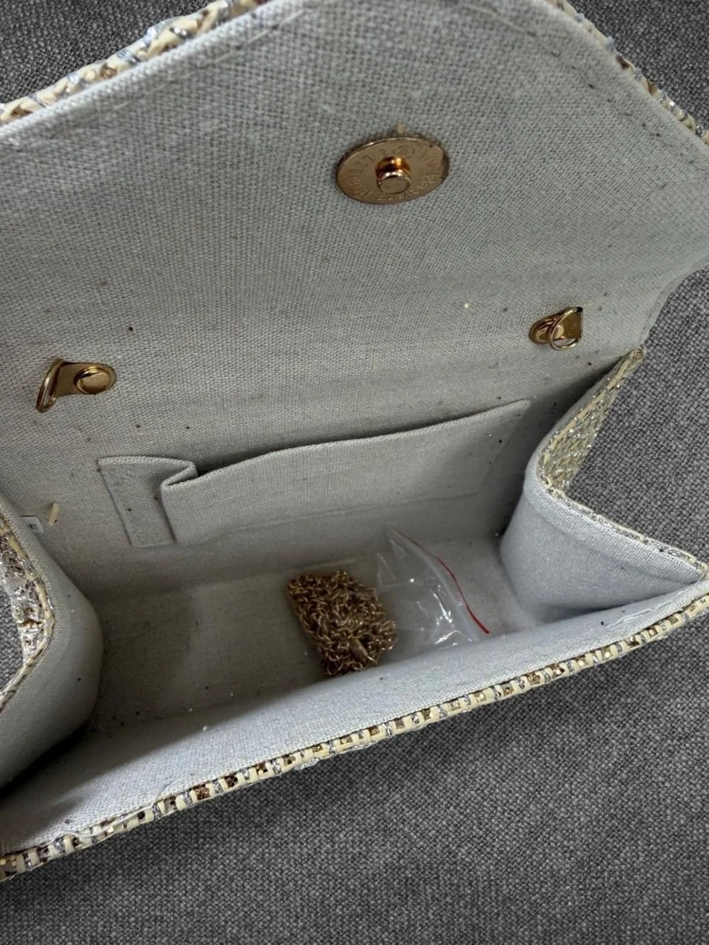 Metallic Gold Woven Envelope Handbag With Wooden Bead Handle And Chain Strap